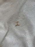 Tiny tail charm