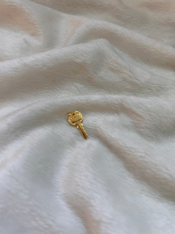 Tiny key charm