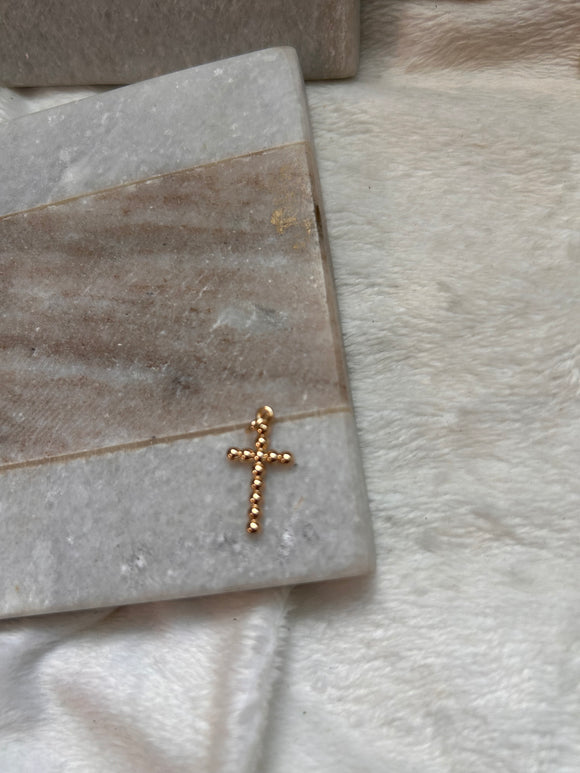 Dots cross charm