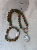 Pearl and brown bracelet