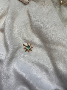 Aqua sun charm