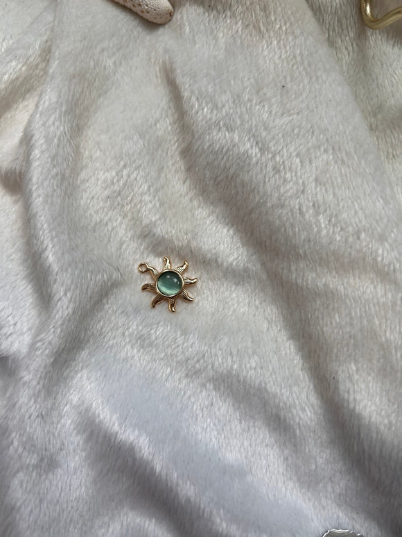 Aqua sun charm