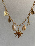 Sun shell charm