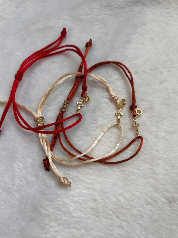 Adjustable cross bracelet