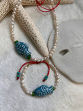Fish and pearls bracelet