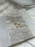 Tiny pearl studs